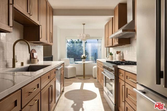 Gourmet kitchen with wood cabinetry
